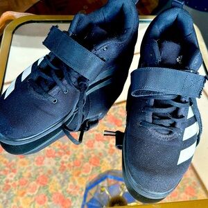 Black Adidas Powerlift shoes